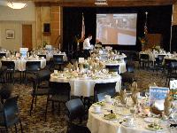 Banquet Room Set Up with White Tableclothes